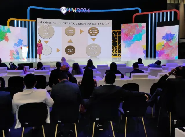 Dr Aleksandra Gardasevic-Slavuljica speaking to an international tourism audience